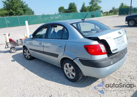 2009 Kia Rio Lx from USA, damaged, VIN KNADE223196444971